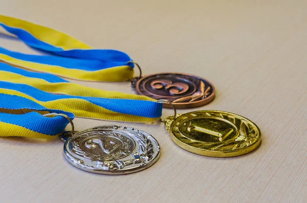 Gold, silver and bronze sports medals. — Stock Photo, Image