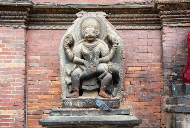 Patan Durbar Meydanı, Katmandu 'da taşa oyulmuş Lord Narasimha' nın ifadesi..