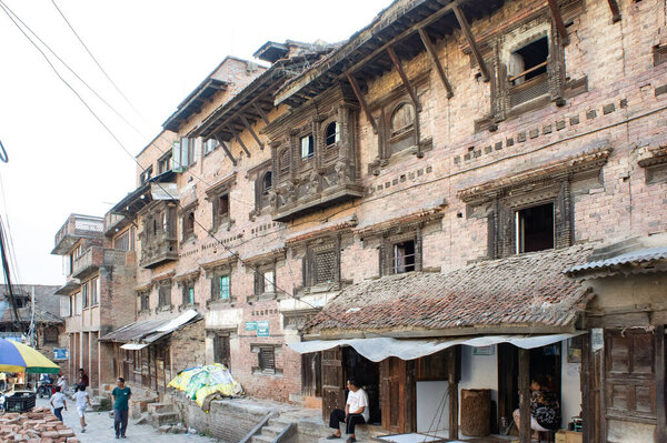 Kathmandu, Nepal - June 03, 2017: View of old residential buildings and routine life of people in Kirtipur.