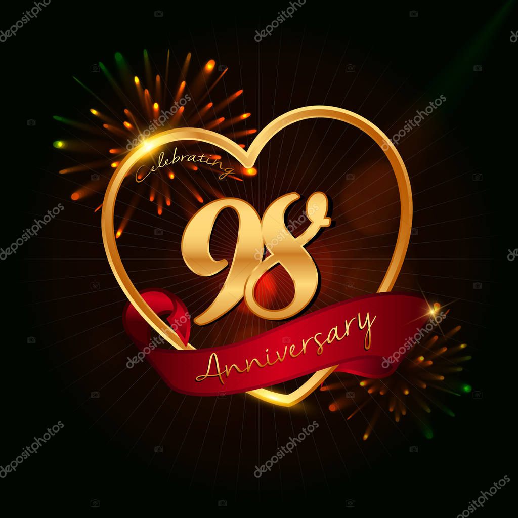 98 years anniversary logo golden colored,with love shape, red ribbon, and fireworks background