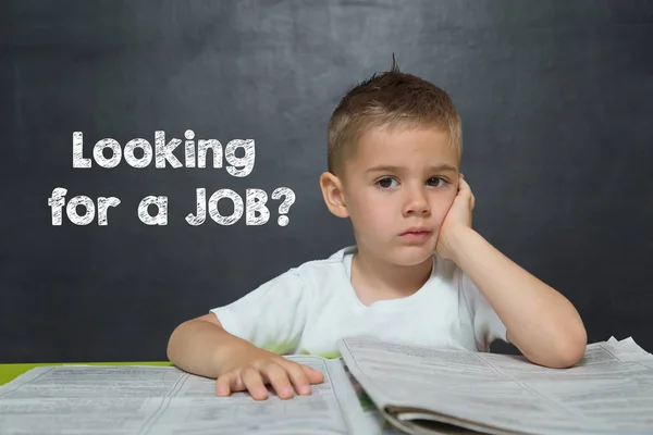 Niño como un hombre de negocios con texto en busca de un trabajo —  Fotos de Stock