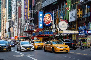 New York City / USA - JUL 13 2018: Times Square street view at rush hour in midtown Manhattan clipart