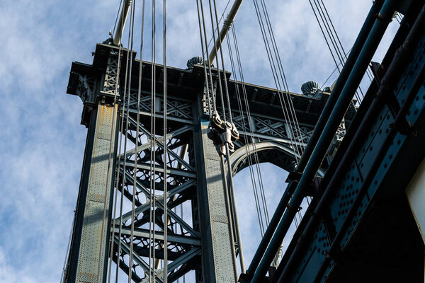 Brooklyn, NY / USA - JUL 31 2018: Looking up at details of Manhattan Bridge
