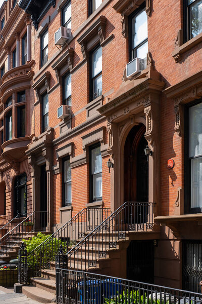 Brooklyn NY - USA - Jul 9 2019: Street scene and apartment buildings of Brooklyn Heights in summer sunny daylight