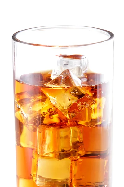 a glass of ice tea with many ice cubes