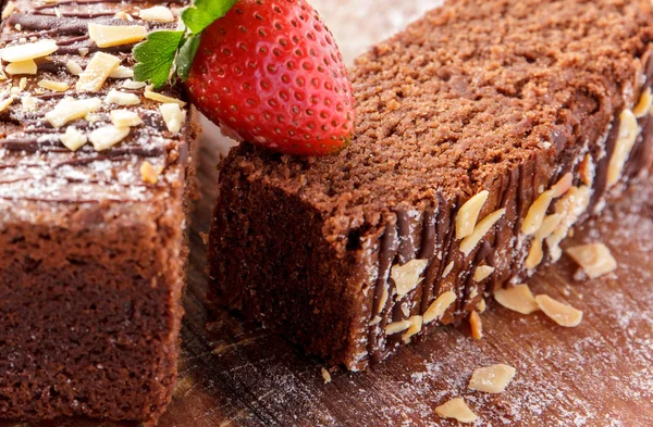 Chocolate brownies with hazelnut and strawberry — Stock Photo, Image
