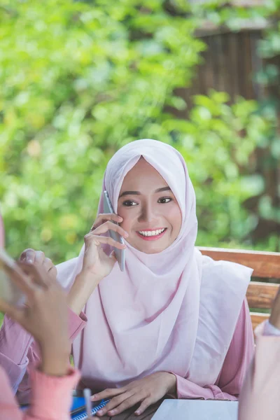 Woman having call in cafe — Stock Photo, Image