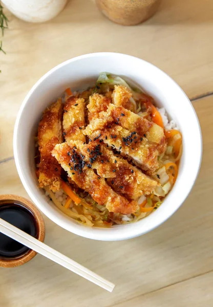 Japanese food chicken katsu don served with soy sauce — Stock Photo, Image