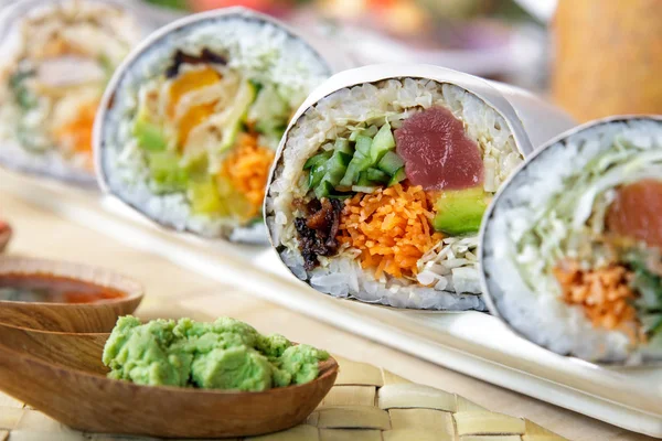 Japanese sushi burrito roll served with wasabi — Stock Photo, Image