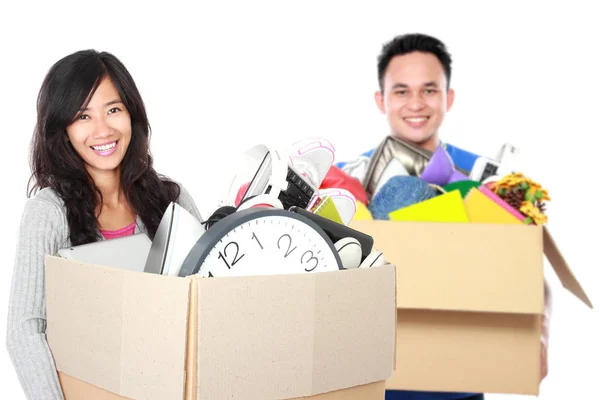 Man and woman holding boxes — Stock Photo, Image