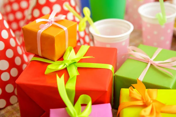 Colorful box gift on table set for child's birthday — Stock Photo, Image