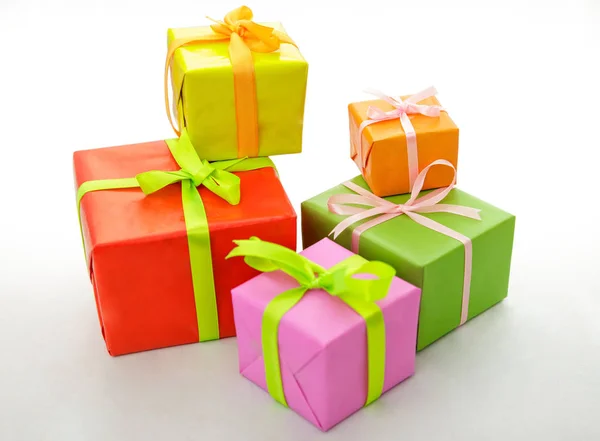 Colorful gift boxes with ribbon — Stock Photo, Image