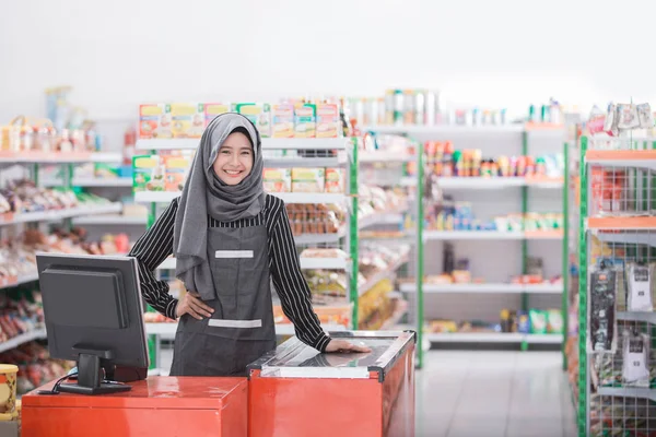 Woman at cash register — Stock Photo, Image