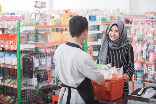 Customer buying  some products — Stock Photo, Image