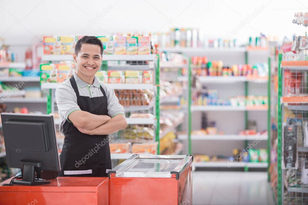 Portrait of a smiling shopkeeper 