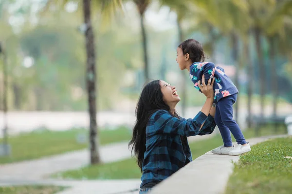 Mother and kid enjoying outdoor — Stock Photo, Image