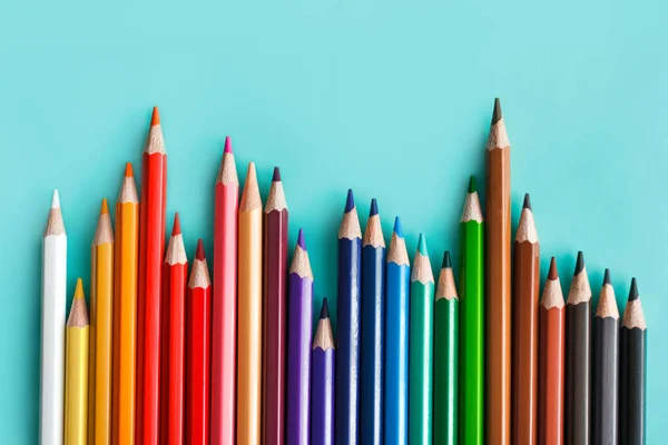 Colorful pencils on pastel background — Stock Photo, Image