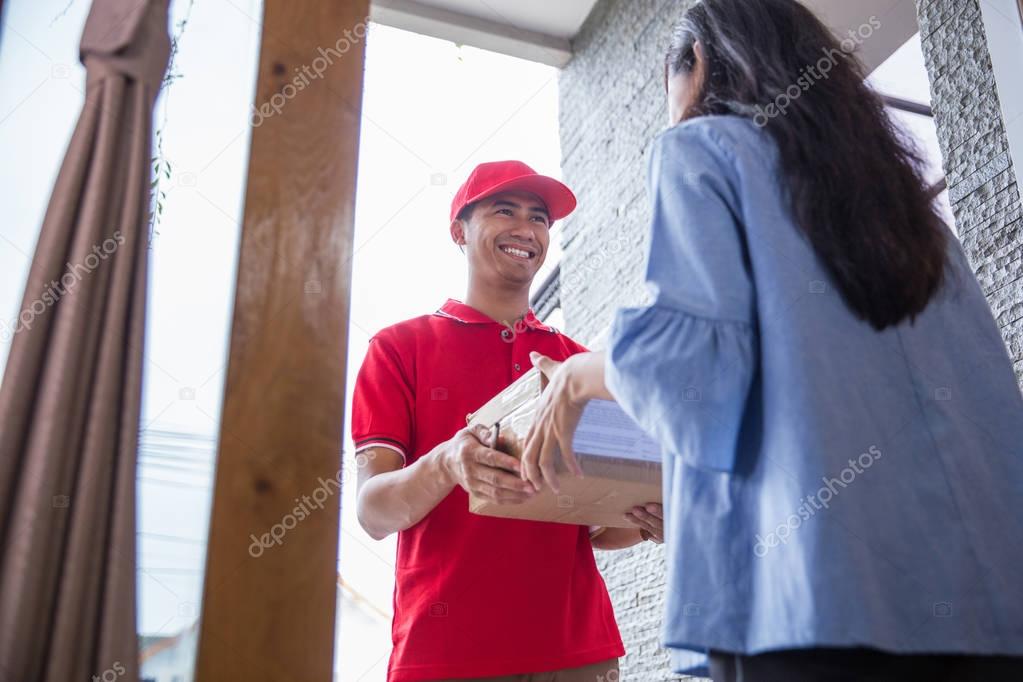 delivery man delivering box