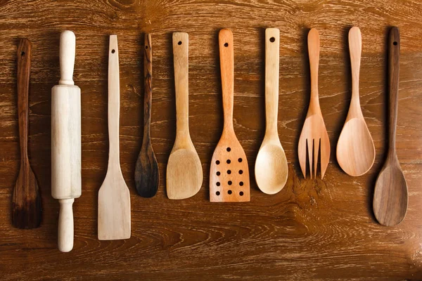 different kitchen utensils made of wood
