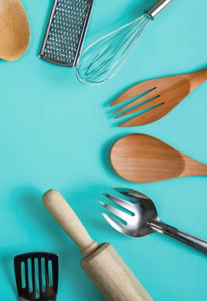 Group of kitchen utensils on blue pastel background — Stock Photo, Image