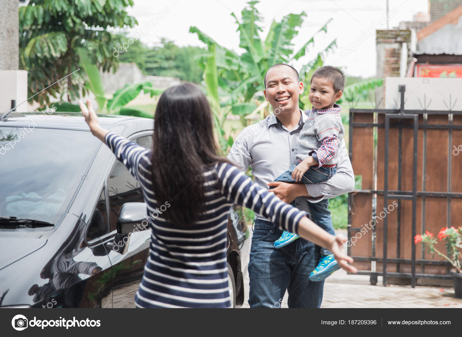 Daddy At Work And At Home Welcoming daddy home after work — Stock Photo © odua #187209396