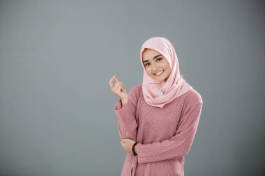 Attractive asian muslim woman clipart