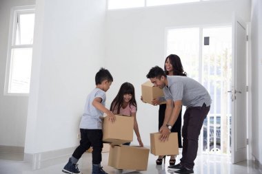  family moving to a new house clipart