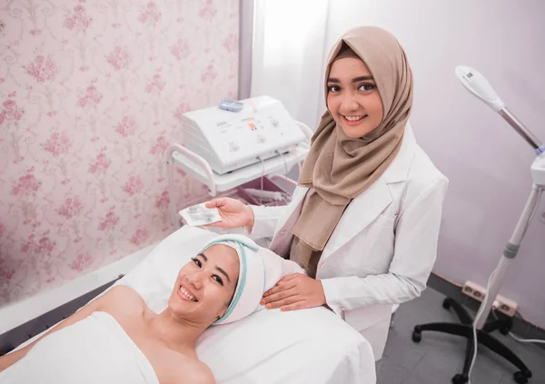 woman facial care after the treatment