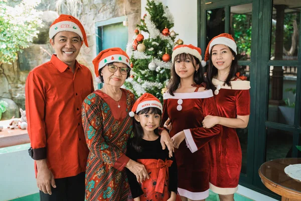asian happy family celebrating christmas together