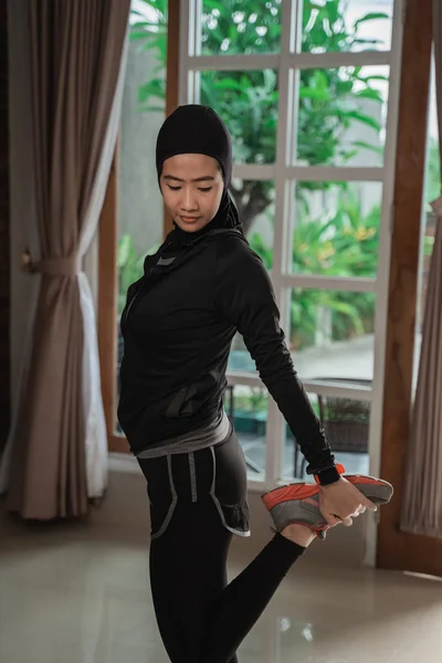 Asian Muslim Woman Instructor Wearing Hijab Doing Yoga Pilates