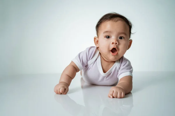 Baby is on his stomach development — Stock Photo, Image