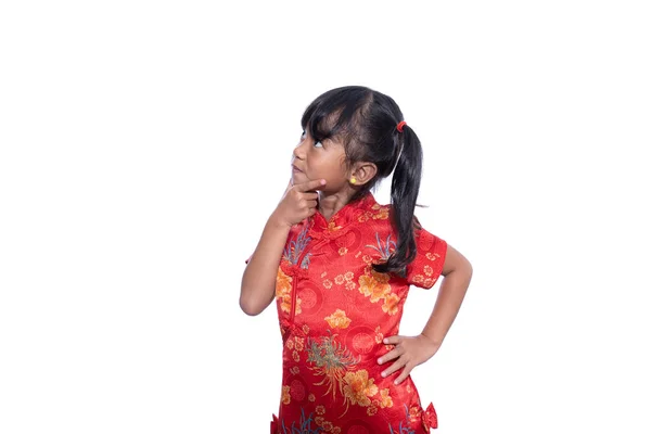 Thinking asian girl with chinese dress — ストック写真