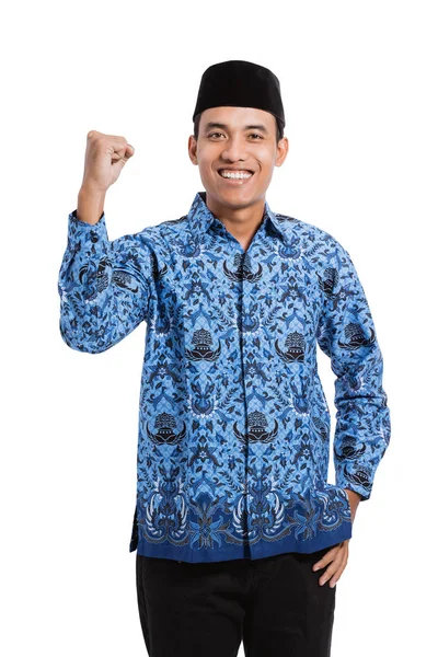 Asiático joven hombre usando batik korpri con spirited mano gesto —  Fotos de Stock