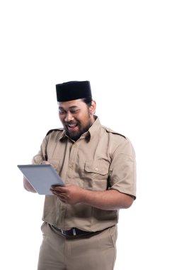 happy indonesian government worker using tabletp pc