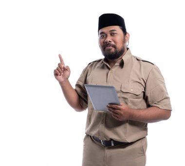 asian worker with brown uniform presenting to copy space