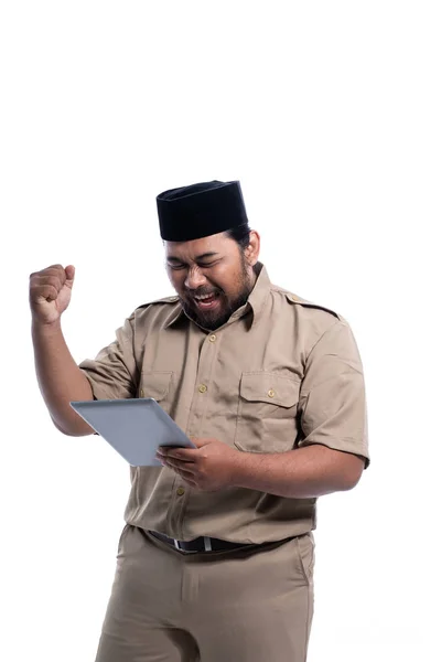 Happy indonesian government worker using tabletp pc — Stok fotoğraf