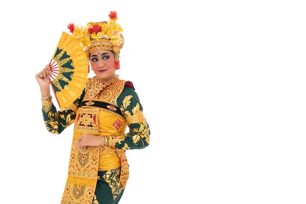 Woman Balinese dancers standing hold a fan — Stock Photo, Image