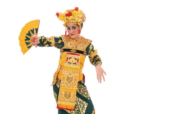 Balinese dancers hold a fan — Stock Photo, Image