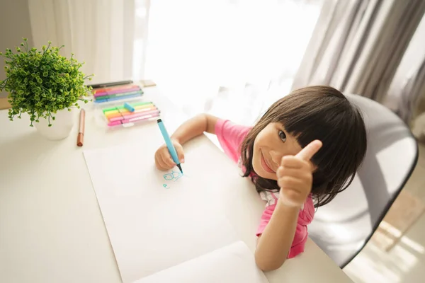 Asian toddler drawing from home — Stock Photo, Image