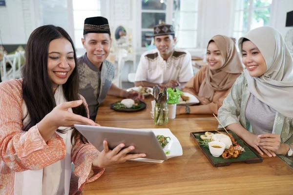 Muslim friend using tablet for presentation — Stock Photo, Image