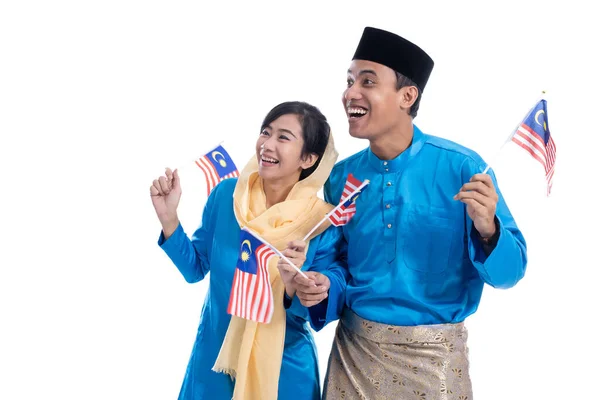 Ζευγάρι με μπλε σημαία εκμετάλλευση malaysia — Φωτογραφία Αρχείου