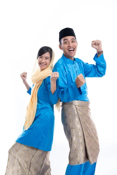 Asian male and female muslim couple excited — Stock Photo, Image
