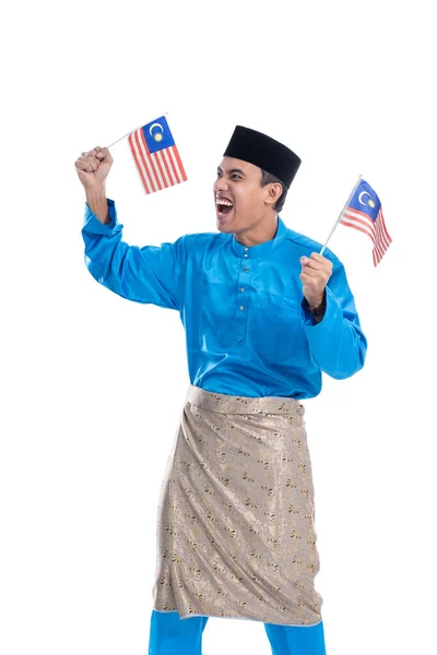 Animado malaysian masculino muçulmano com bandeira — Fotografia de Stock