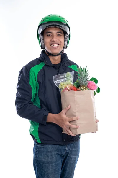 Online driver courier carrying groceries — Stock Photo, Image