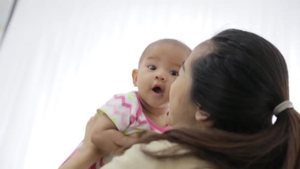 Mother kissing her child — Stock Video