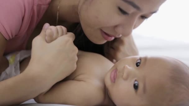 Mother kissing her child — Stock Video