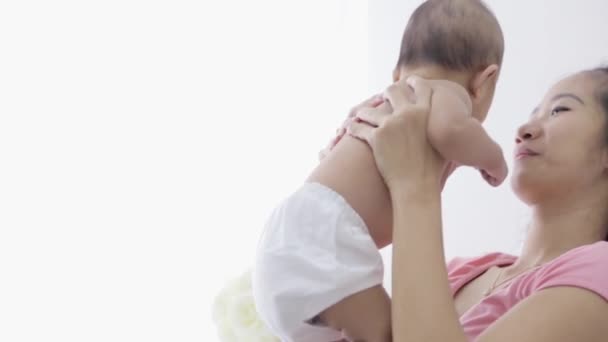 Mother kissing her child — Stock Video