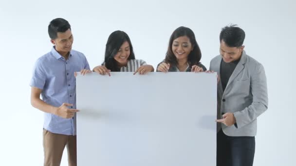 Group of young business people with blank board — Stock Video