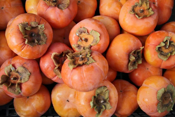 Fruta de cáqui orgânica madura. Padrão de cáqui . — Fotografia de Stock