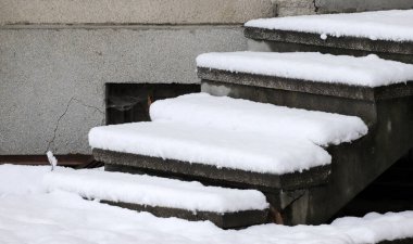 Dangerous uncleaned stairs in front the building, slippery stair